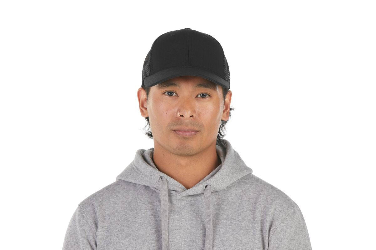 recycled-poly-low-profile-trucker-hat-k4 WebPDP-HAT002002_Recycled_Poly_Low_Profile_Trucker_Hat_Black_Studio_Harper_Studios_0723_Front__HAT002002OS.jpg