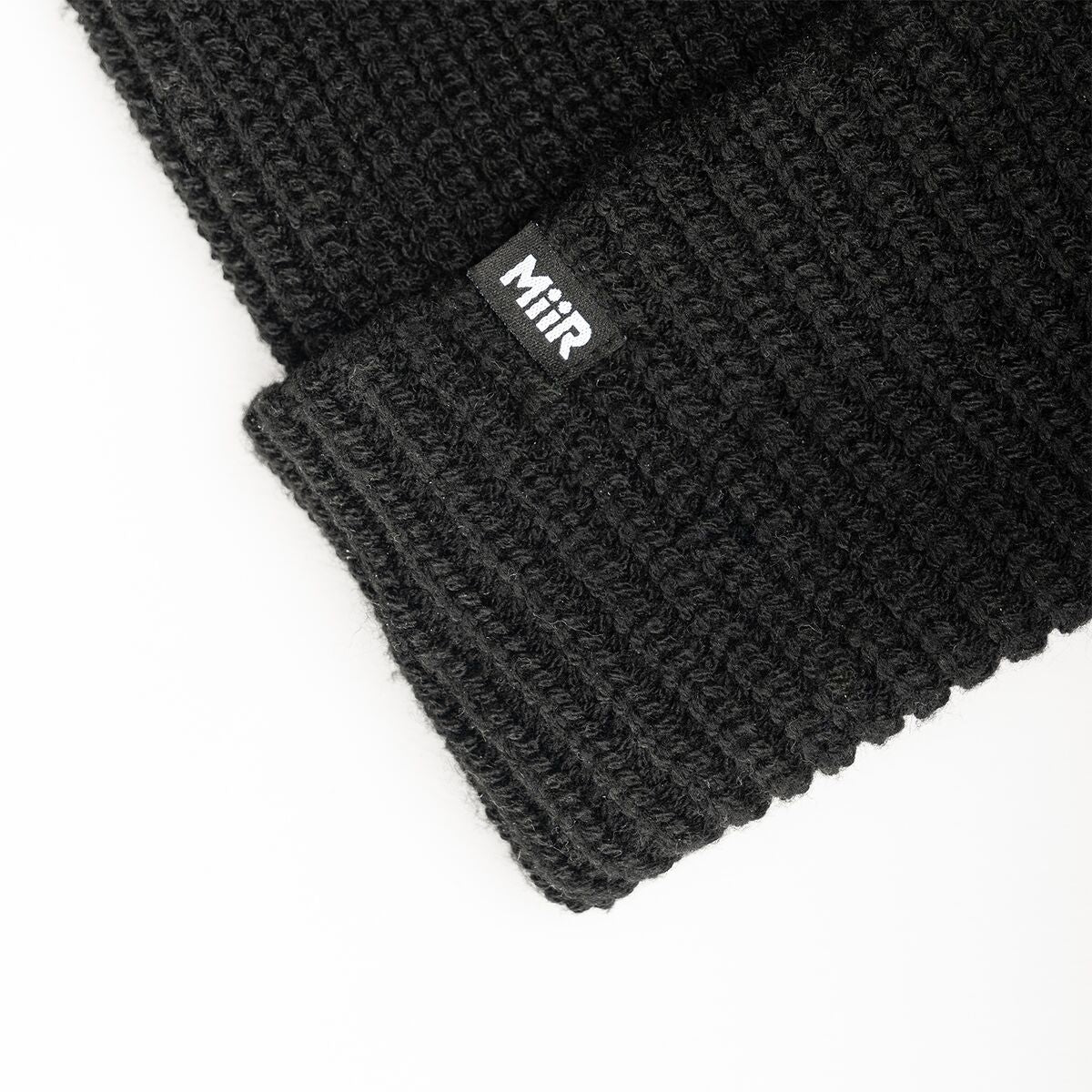 recycled-poly-rib-beanie-s9 WebPDP-RecycledPolyRibBeanie_Studio_TagDetail_Black__BNE002002OS.jpg